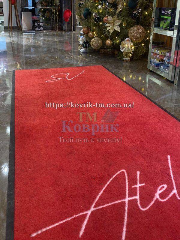 килимок з лого