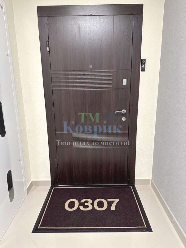 килимок з логотипом новмера квартири купити